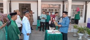 Asisten I Setda Kabgor Nawir Tondako Lantik PAW Kades Modelidu Karim M. Anunu